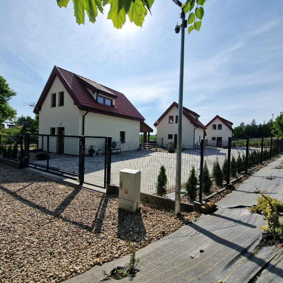 Markowe Domki Ryn  Buitenkant foto